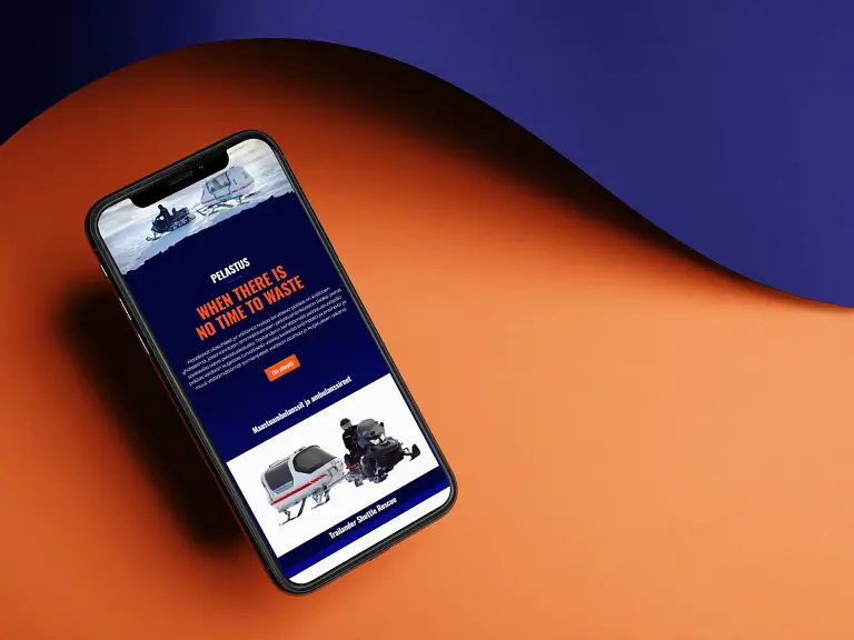 Matkapuhelimessa näkyy moottorikelkkailualan yrityksen verkkosivujen suunnittelu.